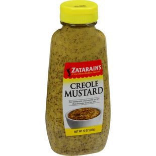 a close up of a jar of mustard with a yellow lid