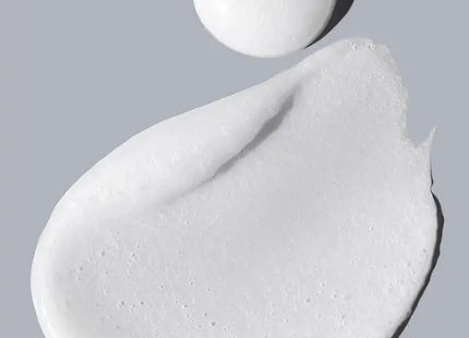 a white substance with a sphere on top