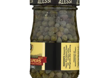 a close up of a jar of olives with a label on it