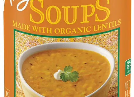 a close up of a can of soup with a spoon in it