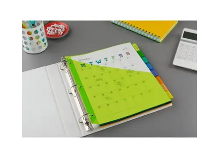 a close up of a binder with a calendar on it