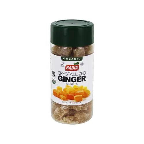 a close up of a jar of ginger on a white background