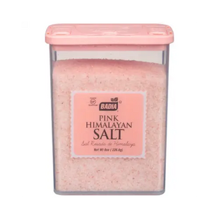 a close up of a container of pink himalayan salt