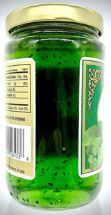 a jar of green liquid with a label on it