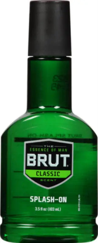 a bottle of green liquid with a black cap