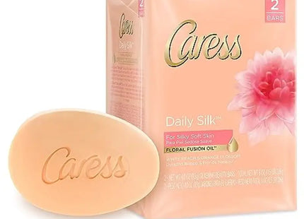 a soap bar with a pink flower on it