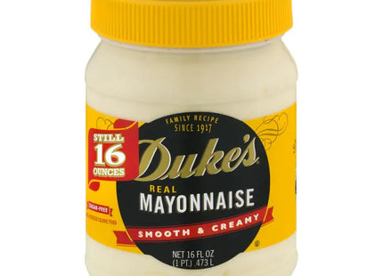 a close up of a jar of mayonnaise with a yellow lid