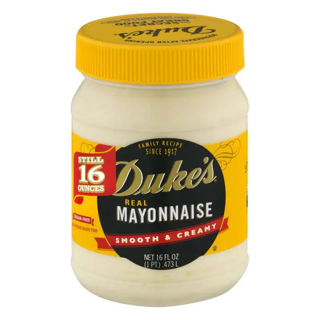 a close up of a jar of mayonnaise with a yellow lid