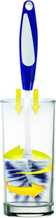 a glass with a blue and yellow object inside