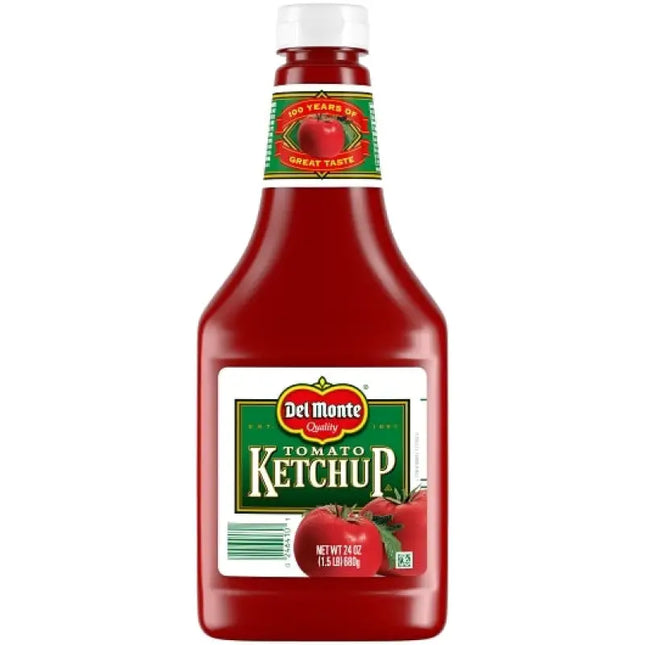 a bottle of ketchup with tomato on a white background