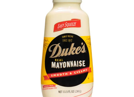 a close up of a bottle of mayonnaise on a white background