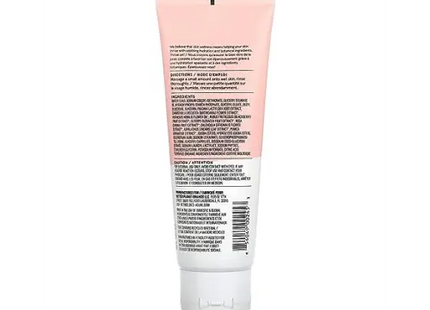 a tube of pink tinted cream on a white background