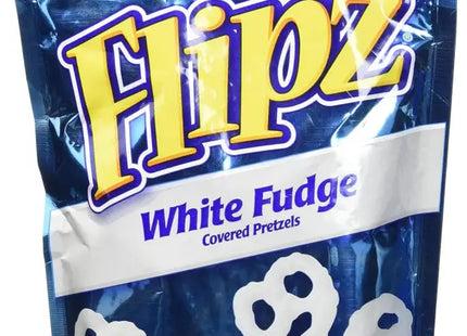 a close up of a bag of white fudge covered pretzels