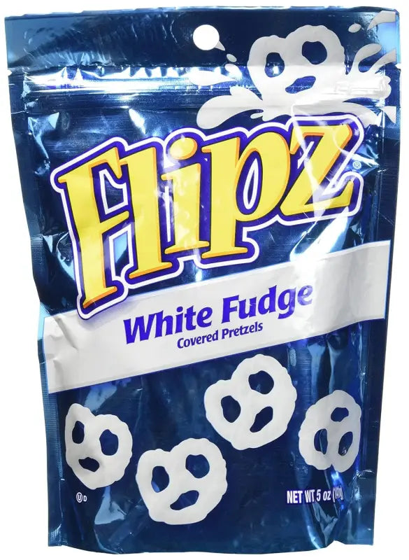 a close up of a bag of white fudge covered pretzels