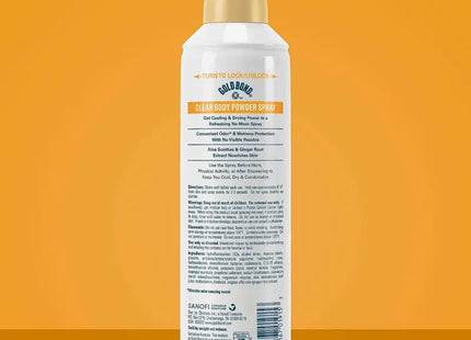 a close up of a bottle of sunscreen on a yellow background