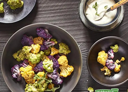 a table topped with bowls of different types of vegetables