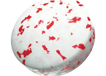 a white and red bath bomb