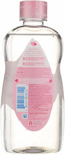 a bottle of water with a pink label