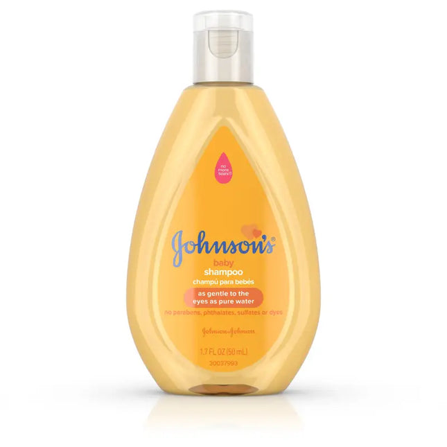 a close up of a bottle of johnson’s shampoo on a white background