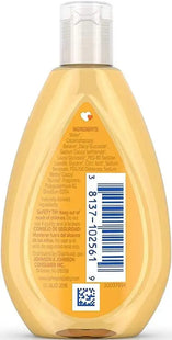 a bottle of liquid with a white label on it