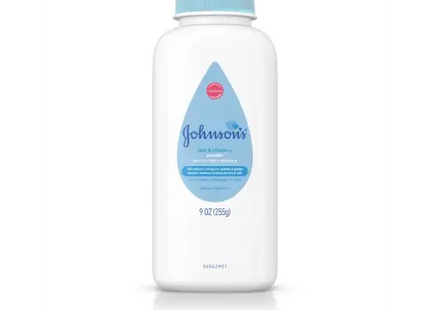 a bottle of baby lotion sitting on top of a white surface