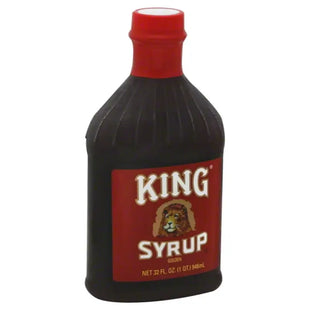 a close up of a bottle of syrup with a lion on it