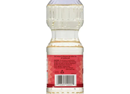 a bottle of water with a red cap