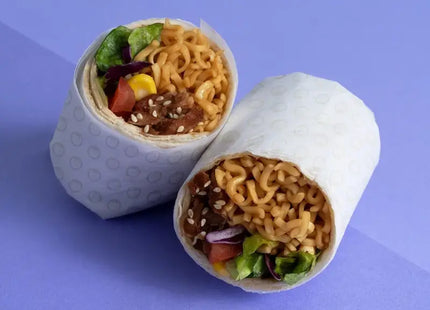 a burritoa filled with noodles and vegetables