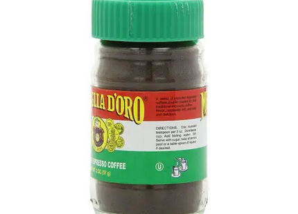 a jar of coffee with a green lid