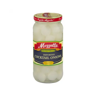 a close up of a jar of pickled cocktail onions