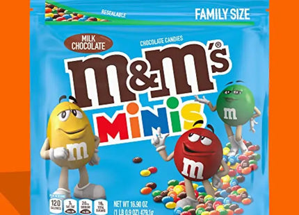 a close up of a bag of m & m’s with a family size