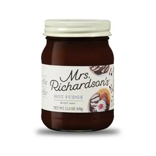 a jar of chocolate spread with a white lid