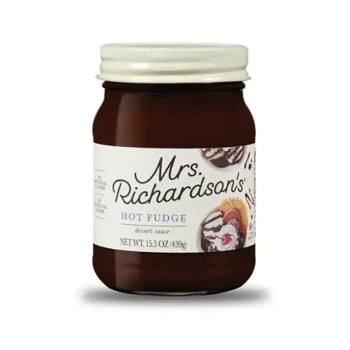 a jar of chocolate spread with a white lid