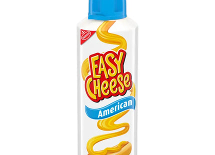 a close up of a bottle of cheese sauce on a white background