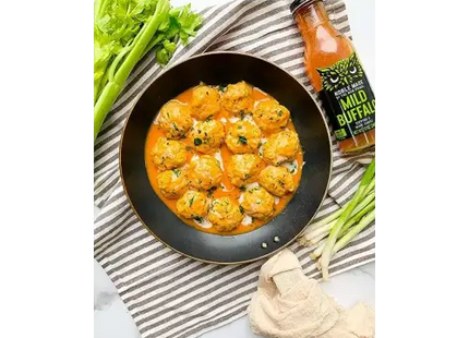 a pan of shrimp and cein with cein sauce