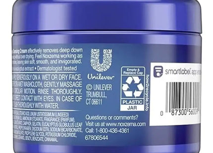 a close up of a jar of blue cream with a barcode on it