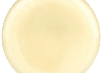 a white paper plate with a circular design