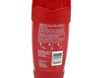 a bottle of red liquid on a white background