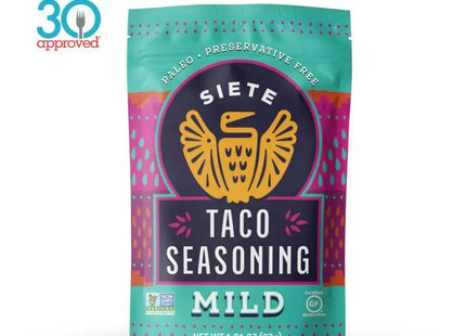 a bag of taco seasoning mild sits on a white surface