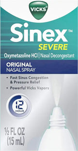 a close up of a bottle of sinex severe spray