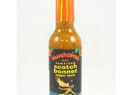 a bottle of hot sauce with a white background