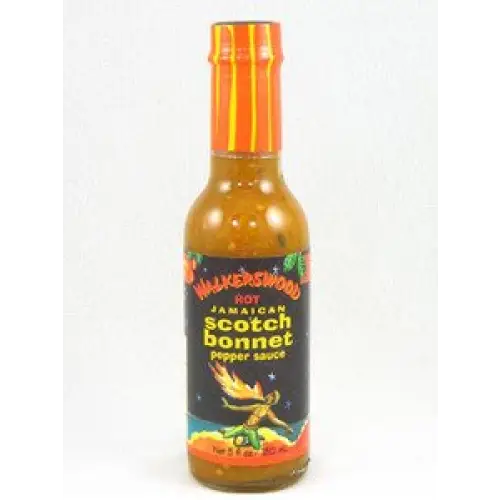a bottle of hot sauce with a white background