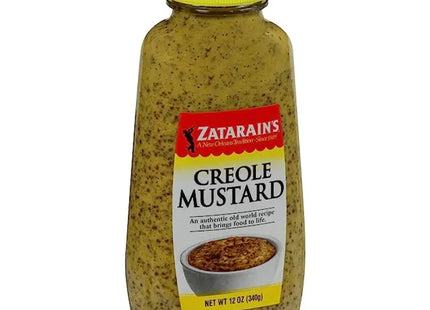 a close up of a jar of mustard with a yellow lid